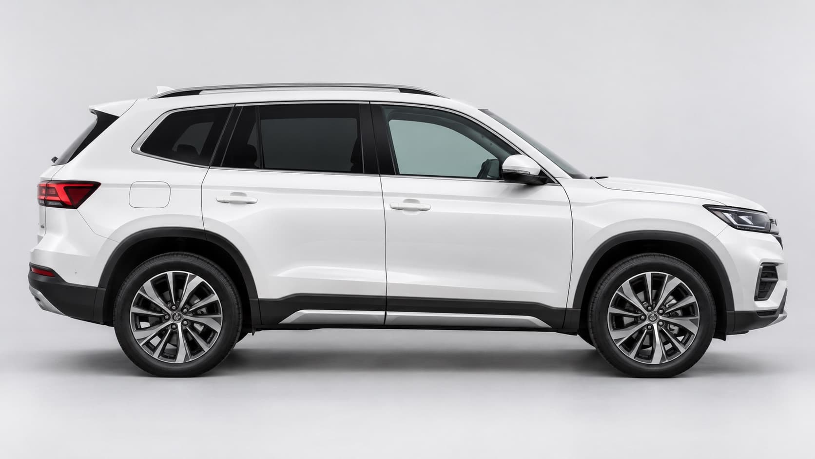 White large suv, side profile